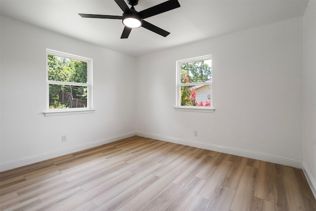 1228 Brookside Dr, Hurst, TX 76053 - spare room featuring plenty of natural light, light wood finished floors, and ceiling fan