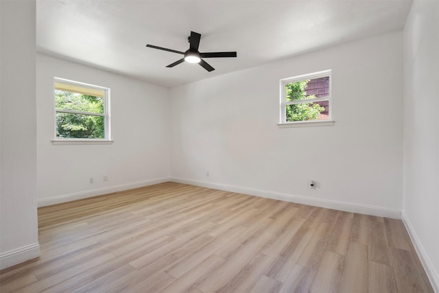 1228 Brookside Dr, Hurst, TX 76053 - unfurnished room with light wood-type flooring and ceiling fan