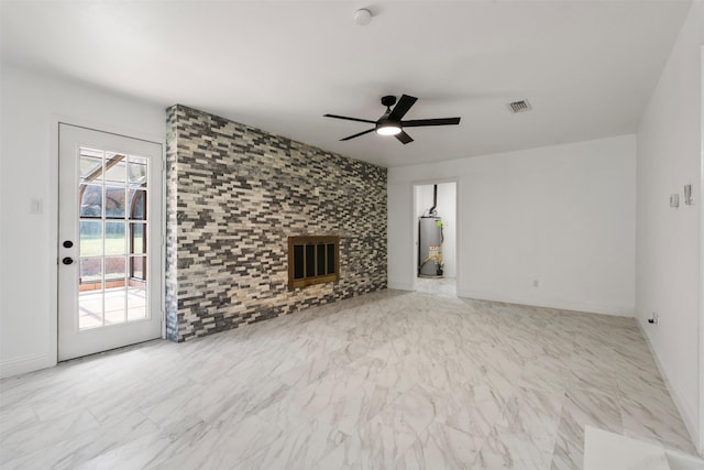 1228 Brookside Dr, Hurst, TX 76053 - unfurnished living room featuring gas water heater, a ceiling fan, and marble finish flooring