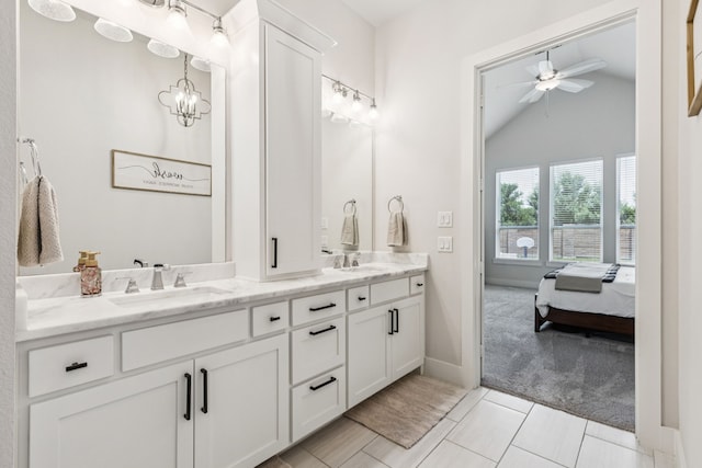 3364 Waverly Dr, Celina, TX 75009 - ensuite bathroom featuring double vanity, a ceiling fan, lofted ceiling, and a chandelier