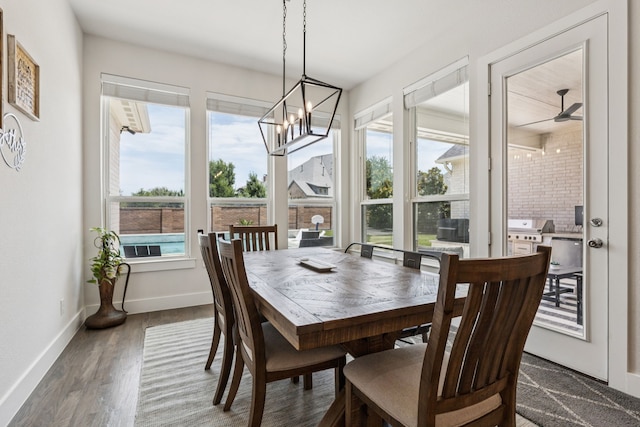 3364 Waverly Dr, Celina, TX 75009 - dining area with plenty of natural light, a chandelier, and dark wood-style flooring