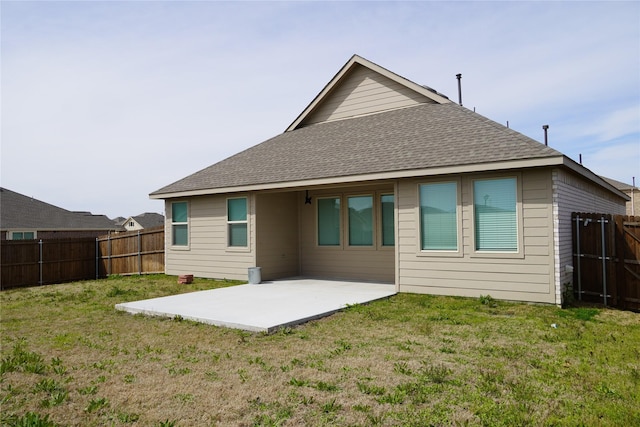 423 Pepperbark Ave, Princeton, TX 75407 - back of house featuring a patio area, a fenced backyard, and a shingled roof