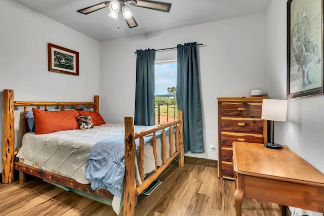 234 Pumphrey Rd, Loving, TX 76460 - bedroom with wood finished floors and ceiling fan