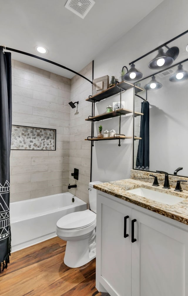234 Pumphrey Rd, Loving, TX 76460 - full bathroom featuring shower / bath combo, vanity, and wood finished floors