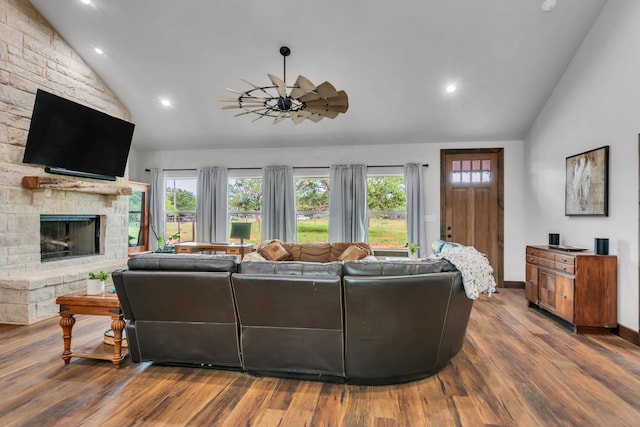 234 Pumphrey Rd, Loving, TX 76460 - living area with recessed lighting, wood finished floors, a stone fireplace, and high vaulted ceiling