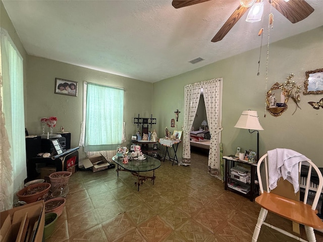 7032 Wofford Ave, Dallas, TX 75227 - living area featuring ceiling fan