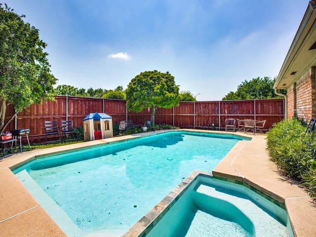 7204 Canongate Dr, Dallas, TX 75248 - view of swimming pool featuring a fenced backyard, a pool with connected hot tub, and grilling area