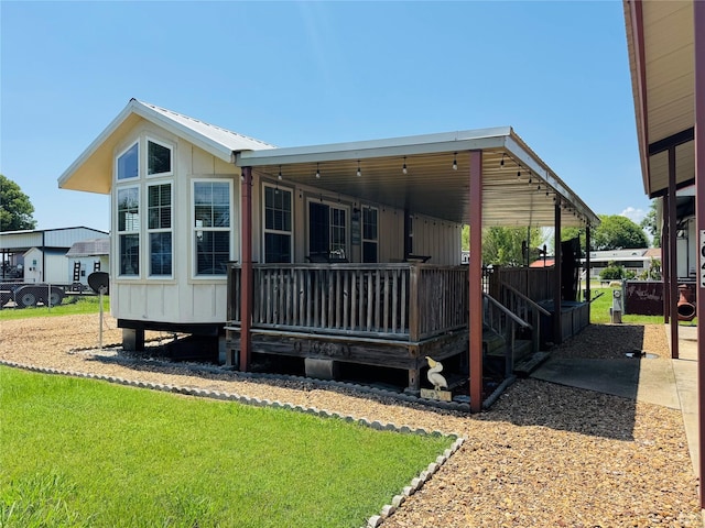 1045 Pelican Isle Dr, Kerens, TX 75144 - rear view of property featuring a yard
