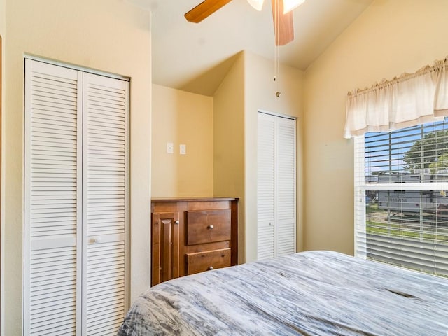 1045 Pelican Isle Dr, Kerens, TX 75144 - bedroom featuring vaulted ceiling, multiple closets, and ceiling fan