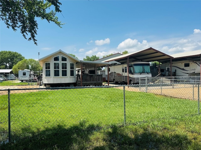 1045 Pelican Isle Dr, Kerens, TX 75144 - rear view of property with a detached carport