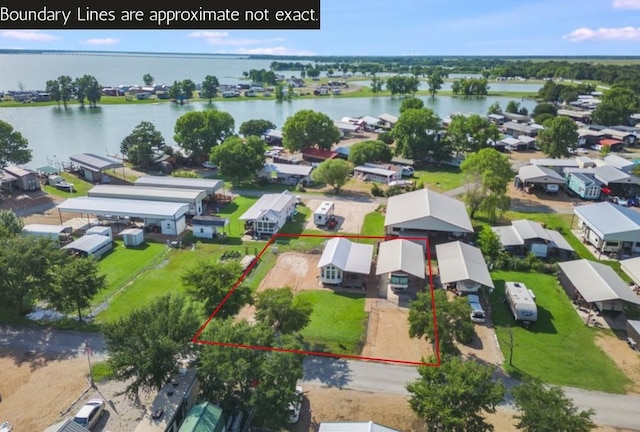 1045 Pelican Isle Dr, Kerens, TX 75144 - aerial perspective of suburban area featuring a nearby body of water and property parcel outlined