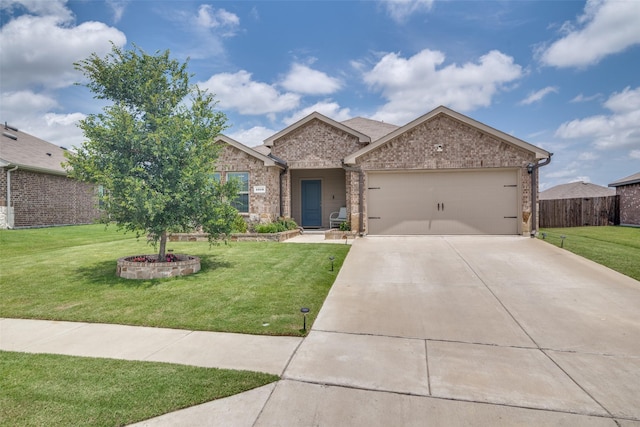1315 Blessed Ln, Royse City, TX 75189 - ranch-style house featuring concrete driveway, an attached garage, and brick siding