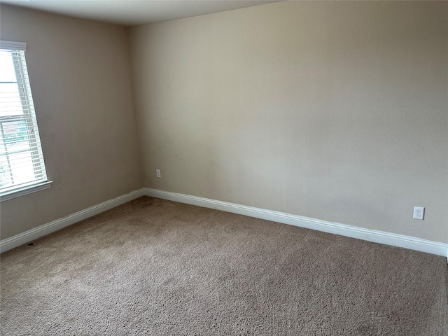 1206 Erika, Forney, TX 75126 - empty room with carpet and healthy amount of natural light