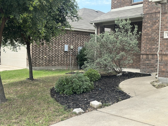 1206 Erika, Forney, TX 75126 - view of yard featuring an attached garage