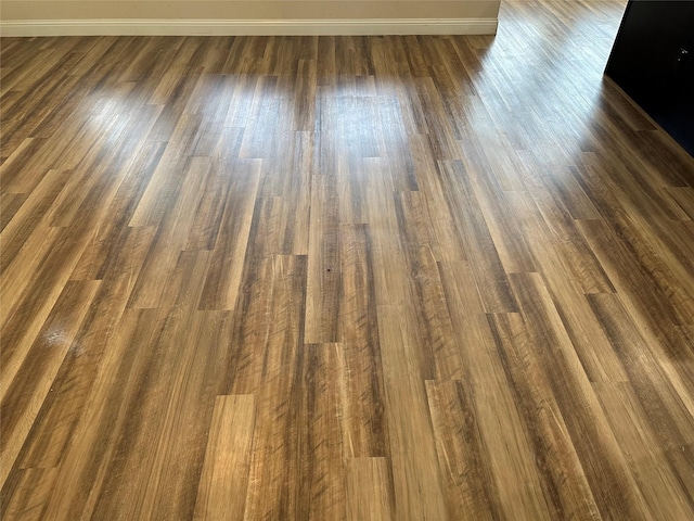 1206 Erika, Forney, TX 75126 - detailed view of baseboards and wood finished floors