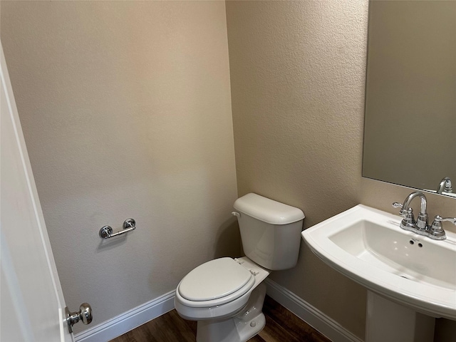 1206 Erika, Forney, TX 75126 - half bath with wood finished floors and toilet