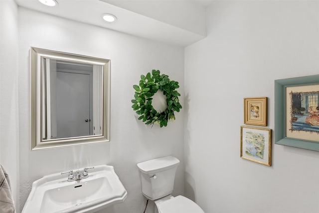 1702 Cheyenne Dr, Richardson, TX 75080 - half bath featuring a sink and toilet