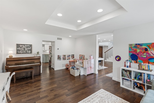 1702 Cheyenne Dr, Richardson, TX 75080 - sitting room featuring wood-type flooring, recessed lighting, stairs, and a raised ceiling