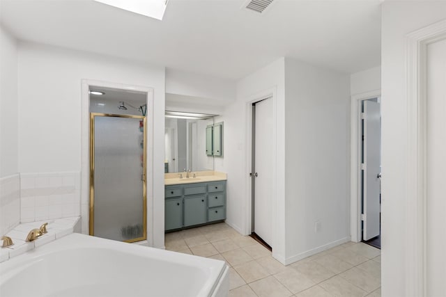 1702 Cheyenne Dr, Richardson, TX 75080 - full bathroom with vanity, a stall shower, tile patterned floors, and a bath