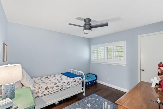 1702 Cheyenne Dr, Richardson, TX 75080 - bedroom featuring wood finished floors and ceiling fan