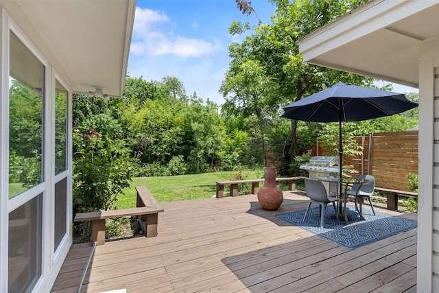 1702 Cheyenne Dr, Richardson, TX 75080 - wooden deck featuring outdoor dining area and view of scattered trees