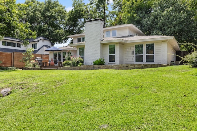 1702 Cheyenne Dr, Richardson, TX 75080 - view of front of house with a chimney