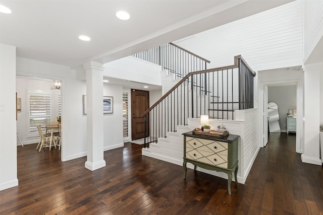 1702 Cheyenne Dr, Richardson, TX 75080 - staircase with hardwood / wood-style floors, ornate columns, and recessed lighting