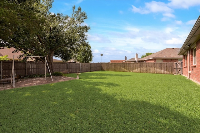 105 Windsor Dr, Forney, TX 75126 - fenced backyard featuring a patio area