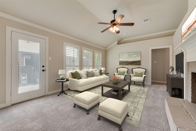 105 Windsor Dr, Forney, TX 75126 - living room with a fireplace, lofted ceiling, light colored carpet, a ceiling fan, and crown molding