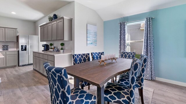 1525 Central Park Dr, Alvarado, TX 76009 - dining area featuring light wood-type flooring, lofted ceiling, and recessed lighting