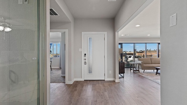 1525 Central Park Dr, Alvarado, TX 76009 - foyer entrance with wood finished floors, a ceiling fan, and recessed lighting