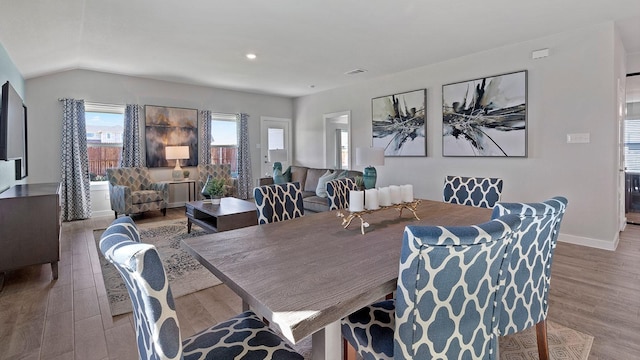1525 Central Park Dr, Alvarado, TX 76009 - dining area featuring wood finished floors, lofted ceiling, and recessed lighting