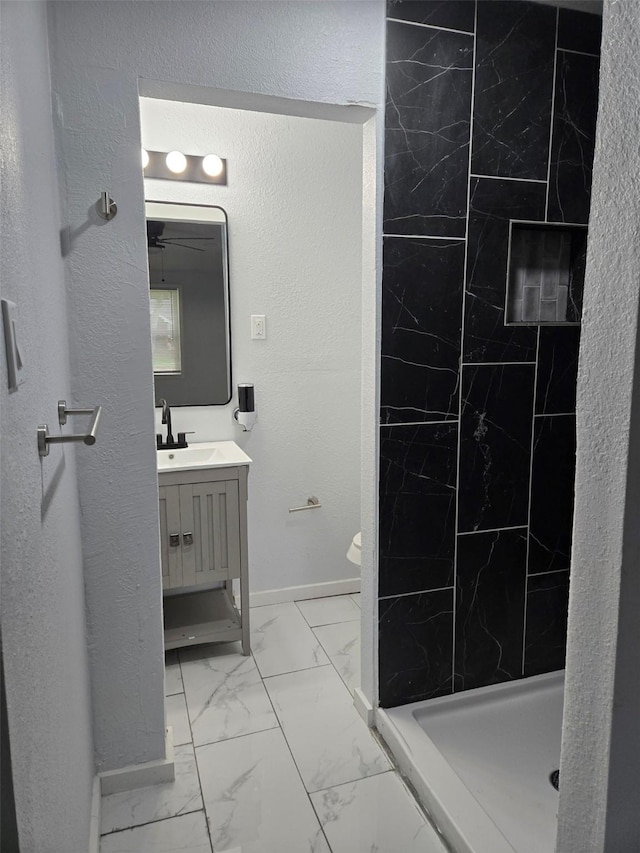 810 Shawnee Trce, Grand Prairie, TX 75051 - bathroom with vanity, marble finish flooring, and a stall shower
