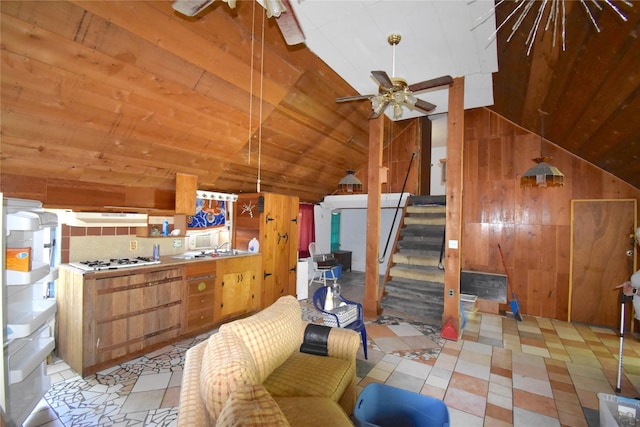 103 One Feather, Whitney, TX 76692 - living room with lofted ceiling, wood ceiling, ceiling fan, stairs, and wooden walls