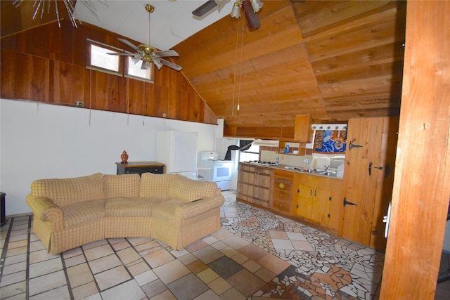 103 One Feather, Whitney, TX 76692 - living area with washer / dryer, a ceiling fan, high vaulted ceiling, and light tile patterned flooring