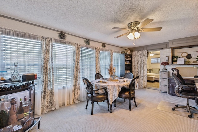 3244 Gail Ct, Irving, TX 75060 - carpeted dining room featuring plenty of natural light, ceiling fan, a textured ceiling, and an office area