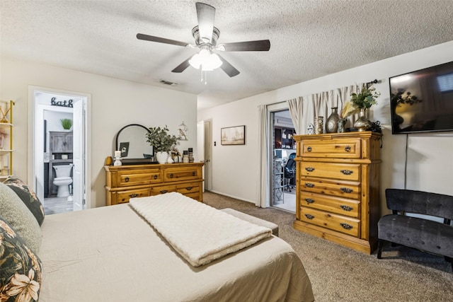 3244 Gail Ct, Irving, TX 75060 - bedroom featuring carpet, a textured ceiling, a ceiling fan, and ensuite bath