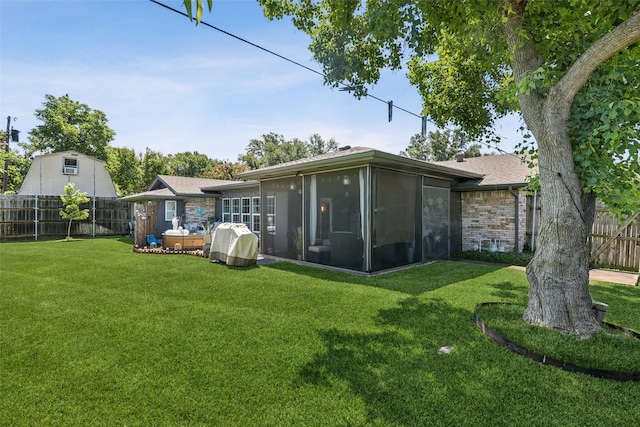 3244 Gail Ct, Irving, TX 75060 - back of house featuring a sunroom and a fenced backyard