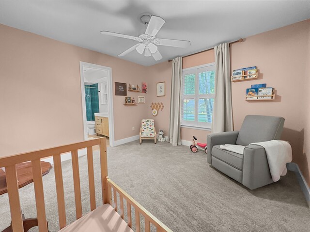 312 Meadowlark Dr, Richardson, TX 75080 - carpeted bedroom featuring a ceiling fan and connected bathroom