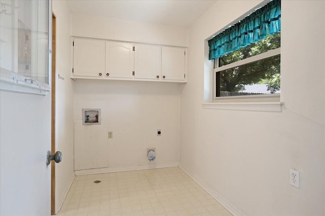2909 Dover Dr, Sherman, TX 75092 - laundry room with cabinet space, electric dryer hookup, hookup for a washing machine, and light floors