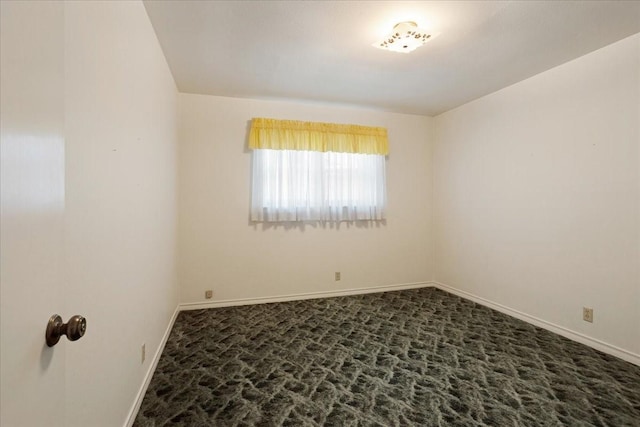 2909 Dover Dr, Sherman, TX 75092 - spare room featuring dark colored carpet and baseboards