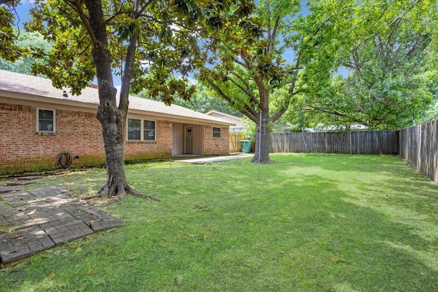 2909 Dover Dr, Sherman, TX 75092 - fenced backyard featuring a patio area