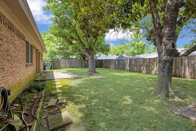 2909 Dover Dr, Sherman, TX 75092 - fenced backyard featuring a patio