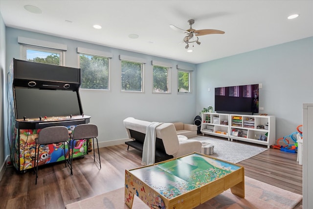 613 N Bailey Ave, Fort Worth, TX 76107 - recreation room featuring healthy amount of natural light, wood finished floors, a ceiling fan, and recessed lighting