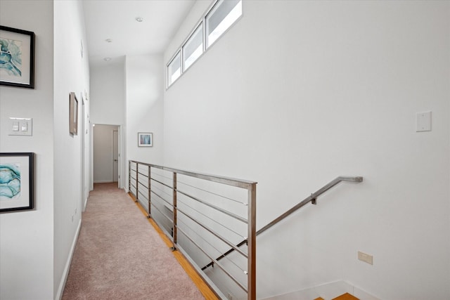 613 N Bailey Ave, Fort Worth, TX 76107 - hallway with an upstairs landing and a towering ceiling