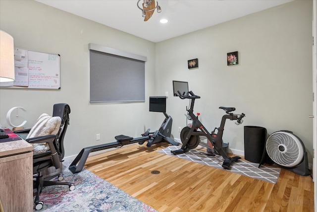 613 N Bailey Ave, Fort Worth, TX 76107 - exercise room featuring light wood-type flooring and recessed lighting