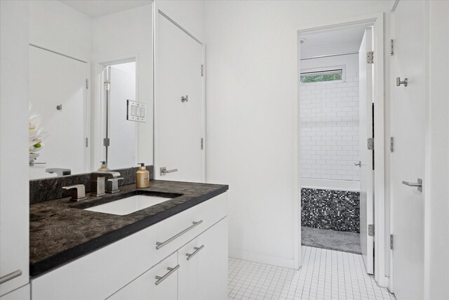 613 N Bailey Ave, Fort Worth, TX 76107 - bathroom with vanity and tile patterned floors