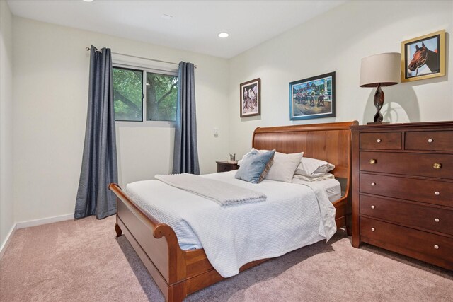 613 N Bailey Ave, Fort Worth, TX 76107 - bedroom featuring light carpet and recessed lighting