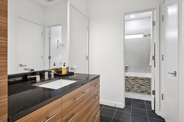 613 N Bailey Ave, Fort Worth, TX 76107 - bathroom featuring tile patterned flooring, vanity, tiled shower / bath, and recessed lighting