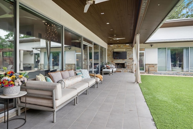 613 N Bailey Ave, Fort Worth, TX 76107 - view of patio featuring ceiling fan and an outdoor living space with a fireplace